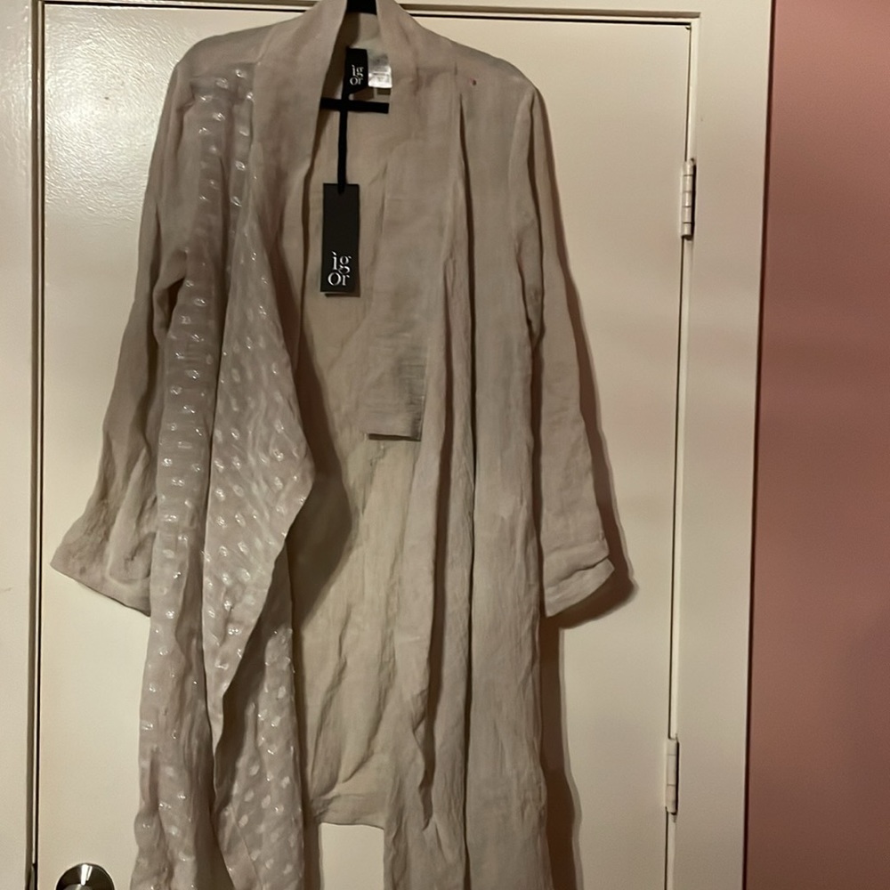 A light weight linen top with shimmering on some part of the fabric.